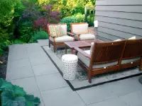 Modern, 2-foot square paver patio.