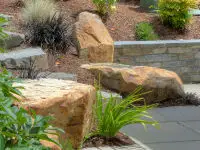 Hillside stairway entry rocks.