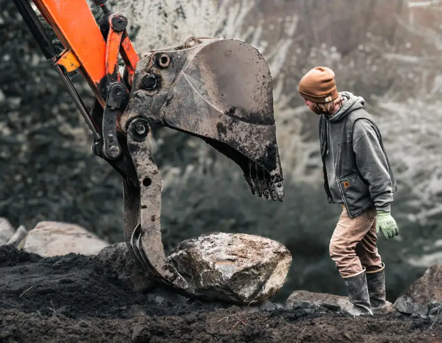 a large rock molded into a patio